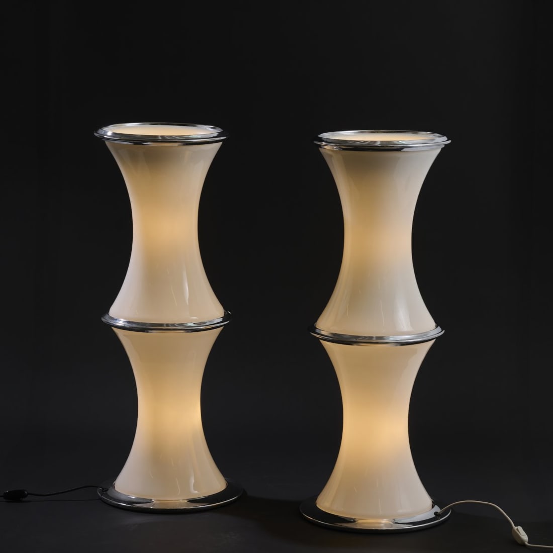 Enrico Tronconi, Two 'Bamboo' floor lamps, c. 1970: <p>H. 86 cm, &Oslash; 30.5 cm. <br />Tronconi, Corsico. <br />White glass, chrome-plated sheet metal.</p>
