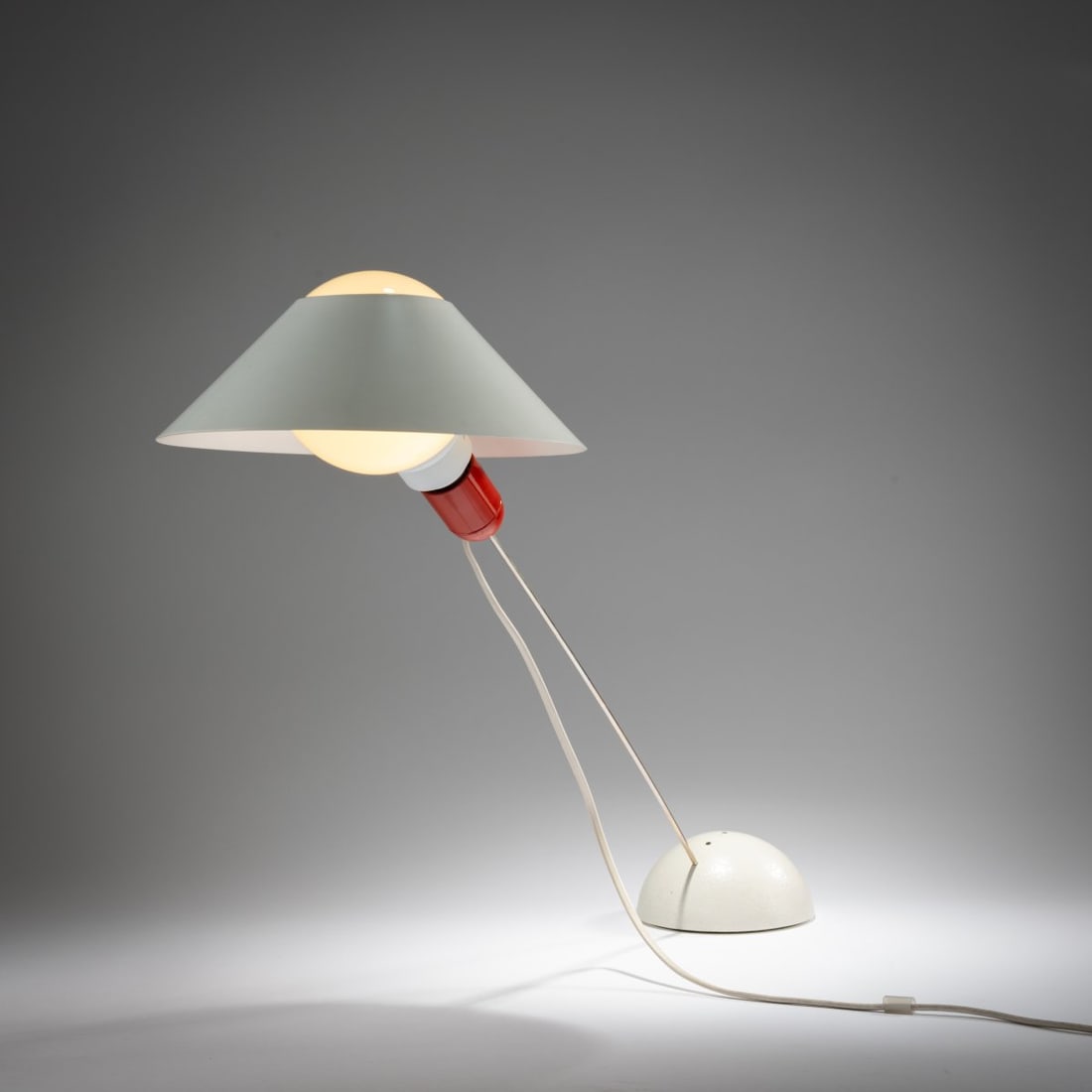 Ingo Maurer, Table light 'Glatzkopf', 1981: <p>H. 63.5 cm (max.), &Oslash; 25.5 cm. <br />Design M Ingo Maurer, Munich. <br />Chrome-plated steel rod, cast metal and sheet metal, painted white and red. <br />Marked: