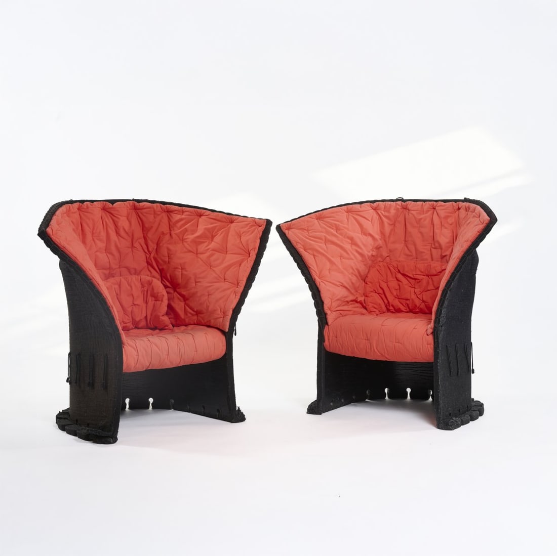 Gaetano Pesce , Two 'i Feltri' armchairs, 1986: <p>H. 98 x 140 x 74 cm. <br />Cassina, Milan. <br />Black felt (partially impregnated with synthetic resin for stabilization), textile fabric,