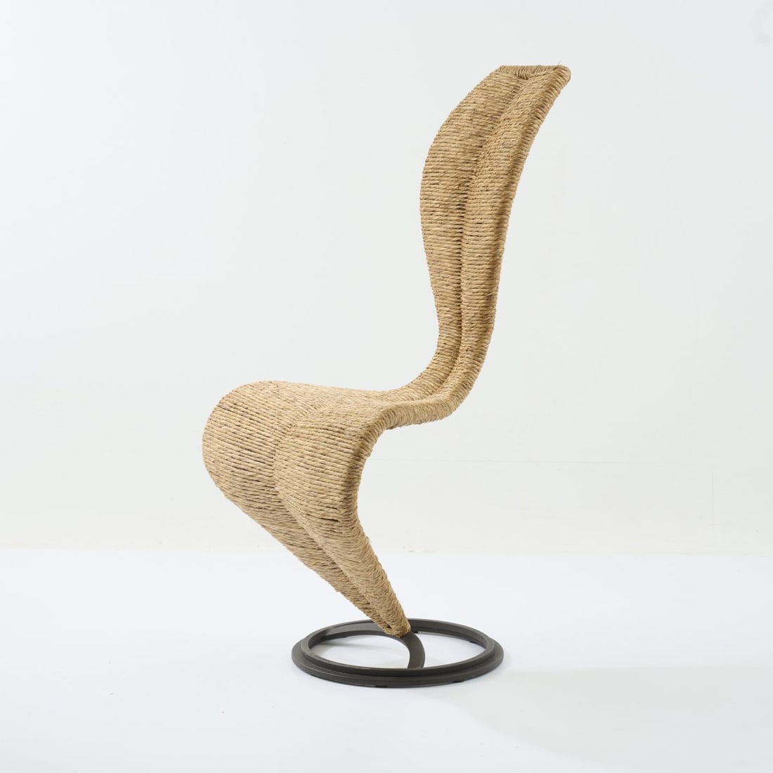 Tom Dixon , Chair 'S-Chair', 1988 (design): <p>H. 101 x 49 x 56.5 cm. <br />Cappellini, Milan. <br />Cast metal, lacquered gray, reed grass weave. <br />Marked: Manufacturer's