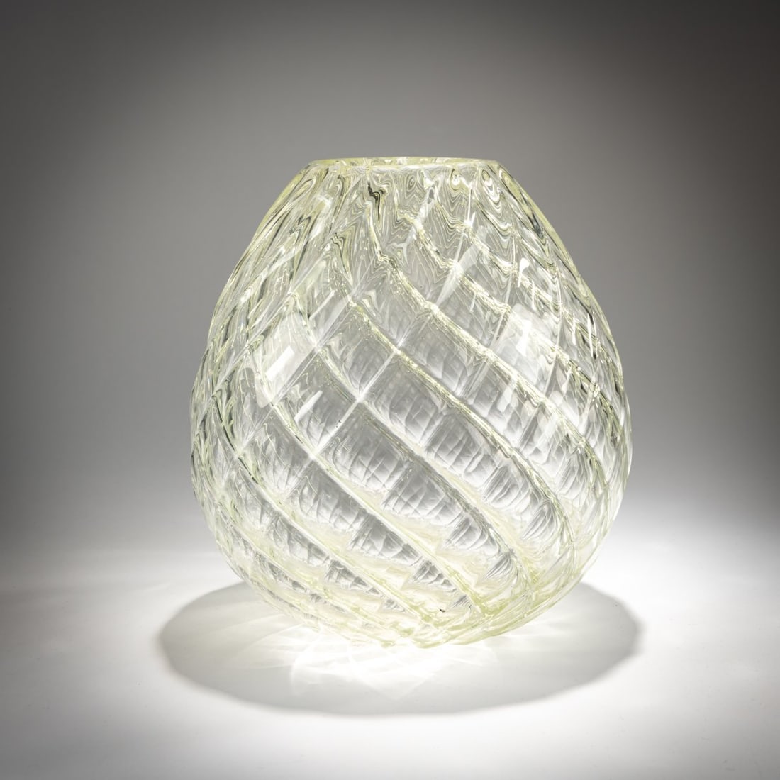 Flavio Poli, Vase 'Cristallo Diamantatol', 1940: <p>Model No. 6286. H. 23 cm. Execution: Seguso Vetri d'Arte. Overlaid glass, colorless, ribbed.</p><hr><p>Literature:</p><p>Marc Heiremans, Seguso Vetri d'Arte, Stu