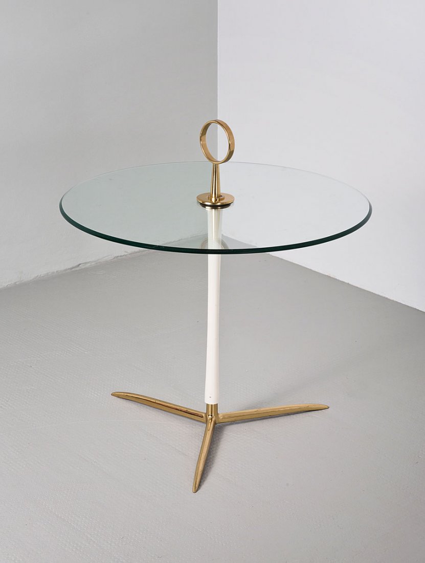Cesare Lacca (attributed). Occasional table, c1955. H. : Cesare Lacca (attributed). Occasional table, c1955. H. 64 cm; D. 60 cm. Brass, tubular steel painted white, glass top.