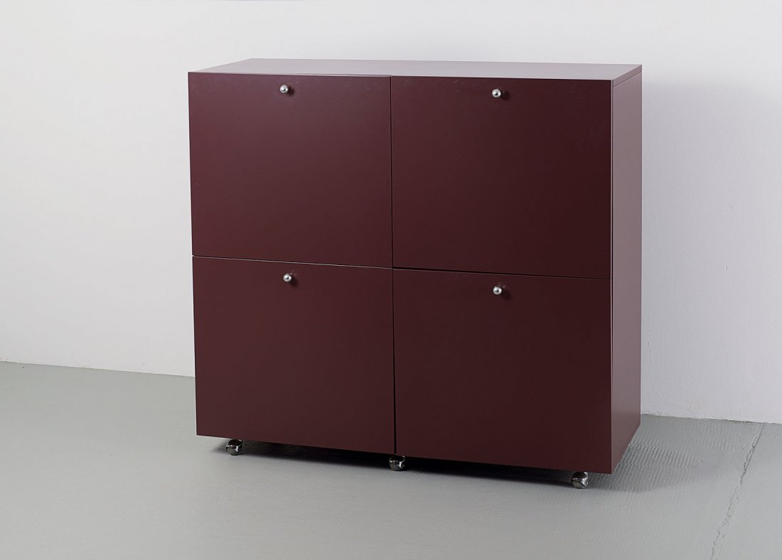Giulio Cappellini; Rodolfo Dordoni. 'Colombia' credenza: Giulio Cappellini; Rodolfo Dordoni. 'Colombia' credenza/cabinet, 1981. H. 114.5 x 120 x 48.5 cm. Made by Cappellini, Milan. MDF slates, painted eggplant purple. Marked: Maker's label.