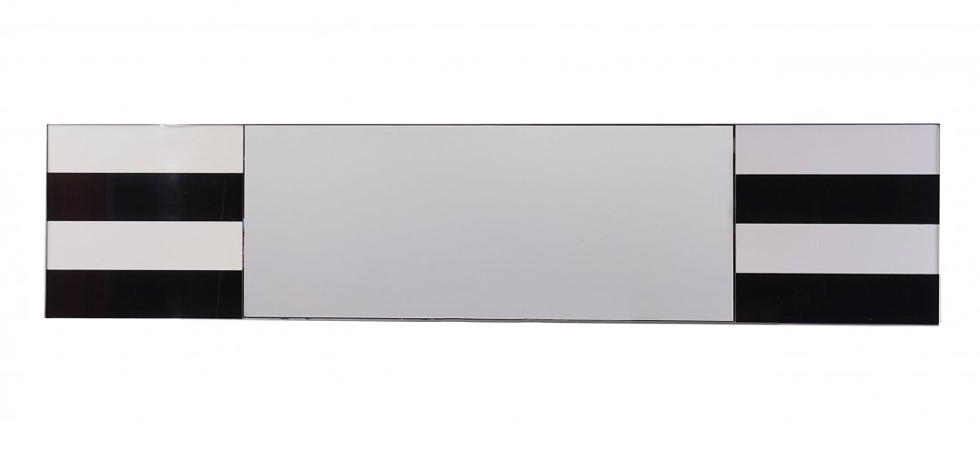 Hans-Walter Stemmann. 'Charleston' wall mirror, 1982. H: Hans-Walter Stemmann. 'Charleston' wall mirror, 1982. H. 180.5 x 40 x 2.5 cm. Made by Schmid & Stemmann, Munich. Polished, chrome-plated brass, acrylic glass, black and white, plate glass, black chipb