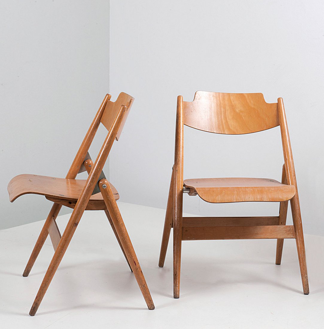 Egon Eiermann. Five 'SE 76' child's folding chairs, 195: Egon Eiermann. Five 'SE 76' child's folding chairs, 1953. H. 63.5 x 41 x 39 cm. Made by Wilde & Spieth, Esslingen. Beech and beech plywood, zinc-plated metal.
