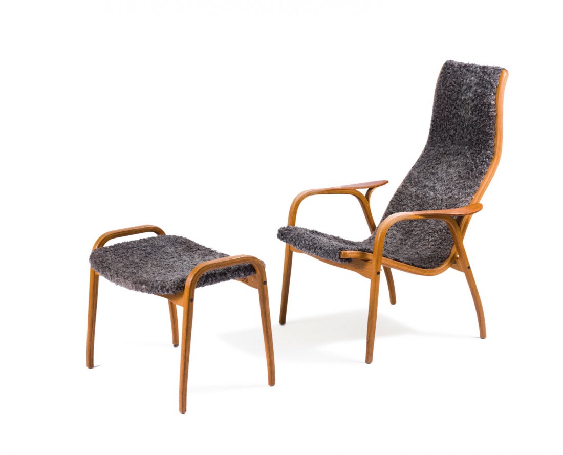 Yngve Ekstr_m. 'Lamino' easy chair and ottoman, 1956. C: Yngve Ekstr_m. 'Lamino' easy chair and ottoman, 1956. Chair: H. 101 x 69.5 x 80 cm; ottoman: H. 48.5 x 59.5 x 45 cm. Made by Swedese M_bler, Vaggaryd. Oak, teak veneer, grey lambskin. Marked: SWEDESE