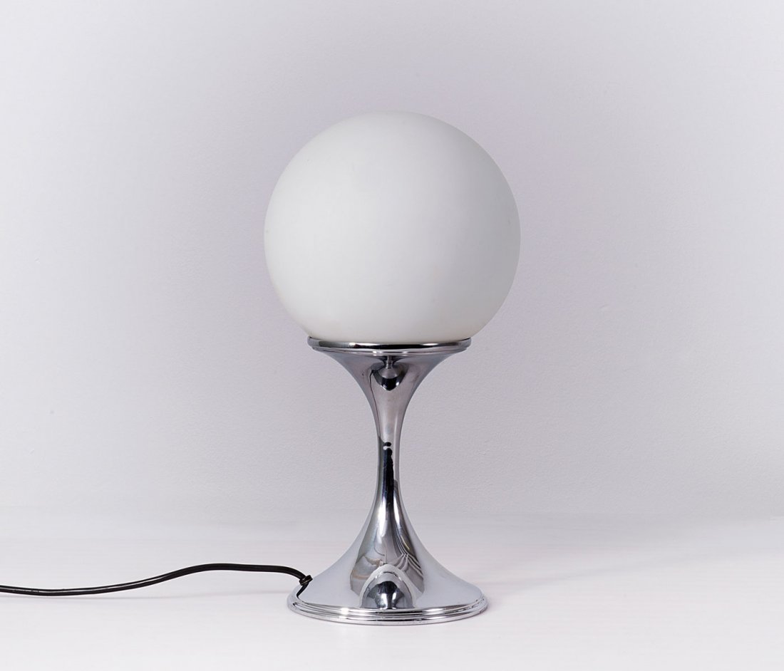 Ingo Maurer. 'ML TR4' table light, c1967. H. 40.5 cm. M: Ingo Maurer. 'ML TR4' table light, c1967. H. 40.5 cm. Made by Design M Ingo Maurer, Munich. Chrome-plated metal, white glass.