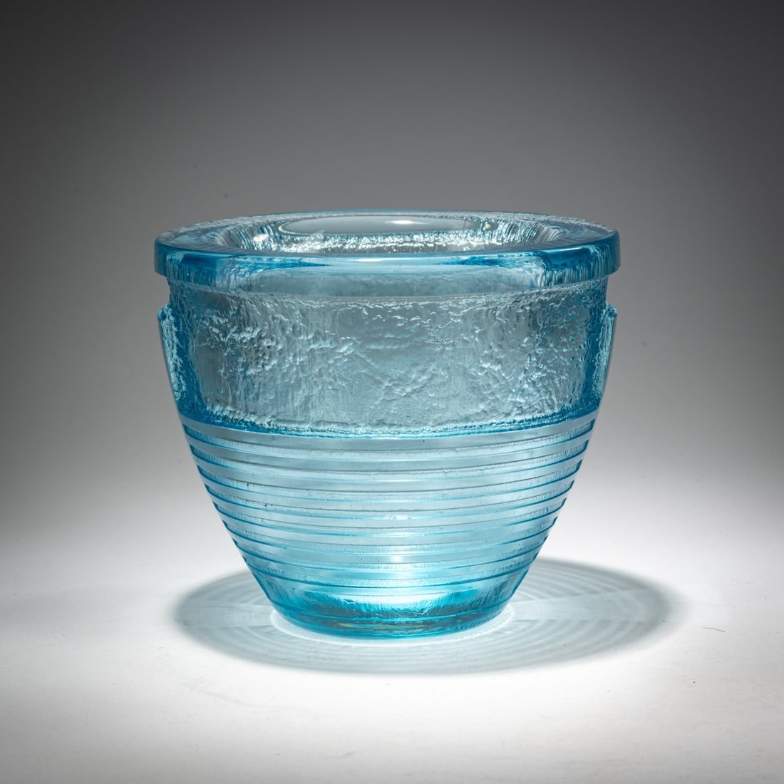 Daum Frères, Nancy, Vase, c. 1930: <p>H. 14.2 cm. Light blue glass, etched. Foot signed: DAUM, Lorraine Cross, NANCY FRANCE (engraved). </p>