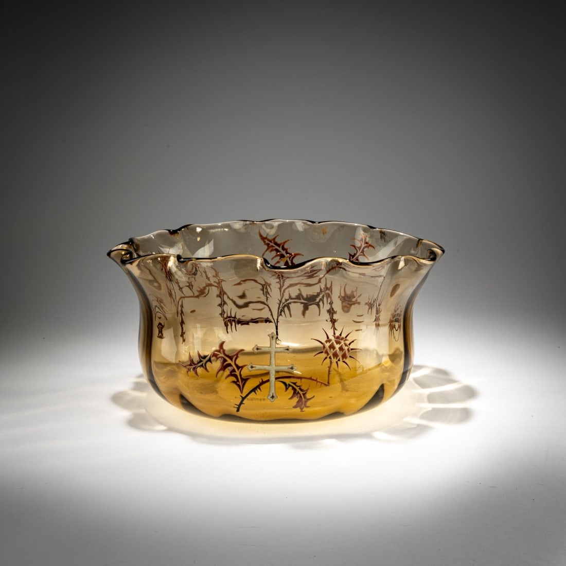 Emile Gallé, Nancy, 'Chardons et Croix de Lorraine' planter, c. 1884: <p>H. 15 cm, 32 x 25.5 cm. Smoke brown glass, slightly optically blown, enameled and partially gilded decoration with thistles and the Lorraine Cross. Bottom signed: Emile Gall&eacute; (need