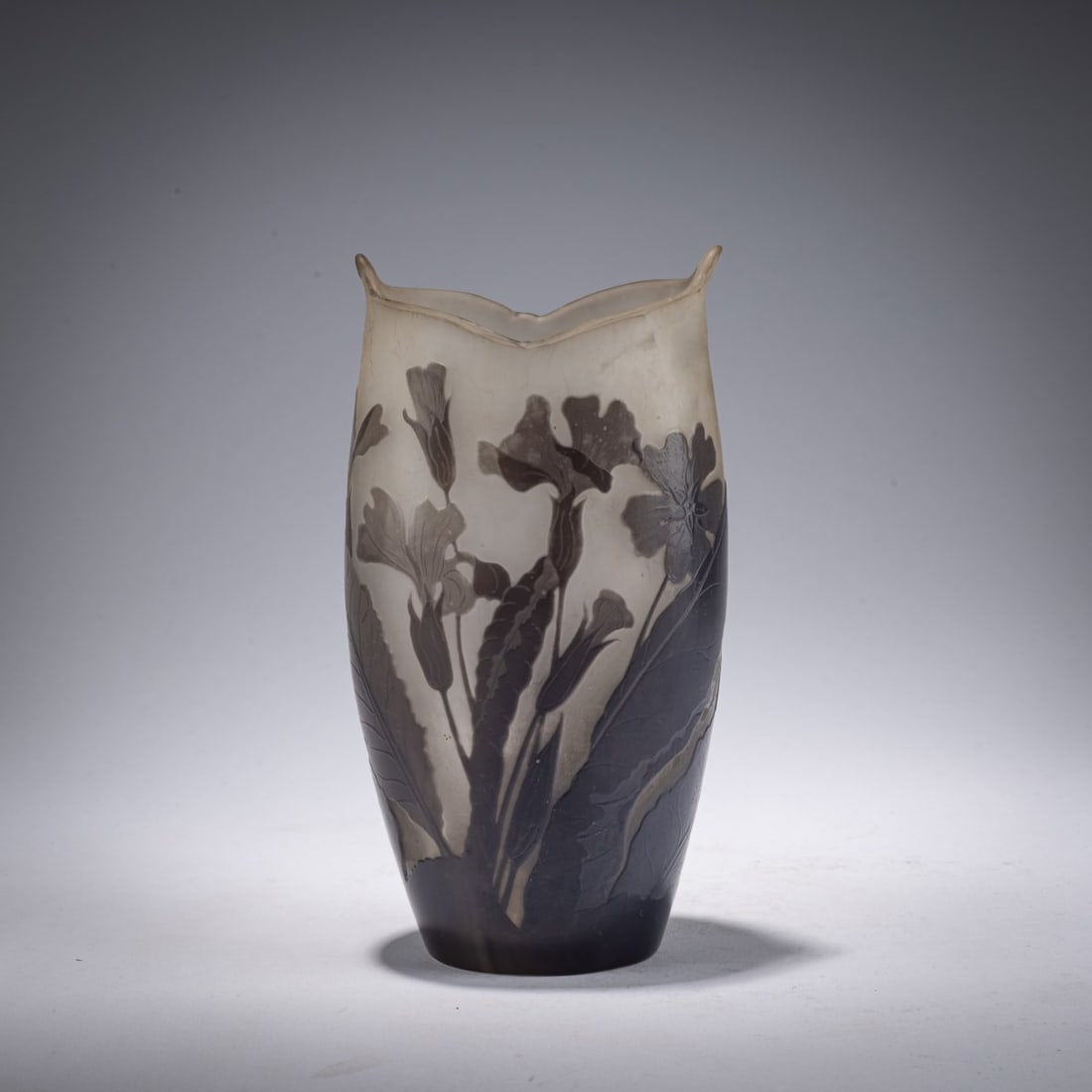 Etablissements Gallé, Nancy, 'Géranium' Vase, 1908-20: <p>H. 16 cm. Overlaid glass, colorless, matte and violet. Etched decoration with geranium. Signed: Gall&eacute; (raised). </p>