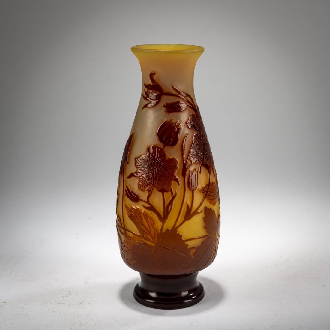 Etablissements Gallé, Nancy, Small Vase 'Mauves', 1920-36: <p>H. 16.5 cm. Cased glass, colorless, vanilla yellow, and brown. Etched decoration with mallow. Signed: Gall&eacute; (raised). </p>