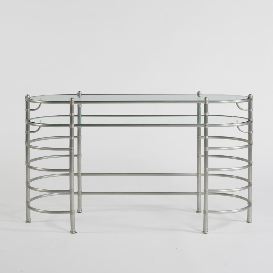 Warren McArthur, Sideboard, c. 1930 (design): <p>H. 78 x 137 x 47 cm. <br />ClassiCon, Munich, 1990s. <br />Aluminum tube, aluminum sheet, colorless glass. <br />Marked: Manufacturer's stamp, ClassiCon AR 20104 Warren McAr