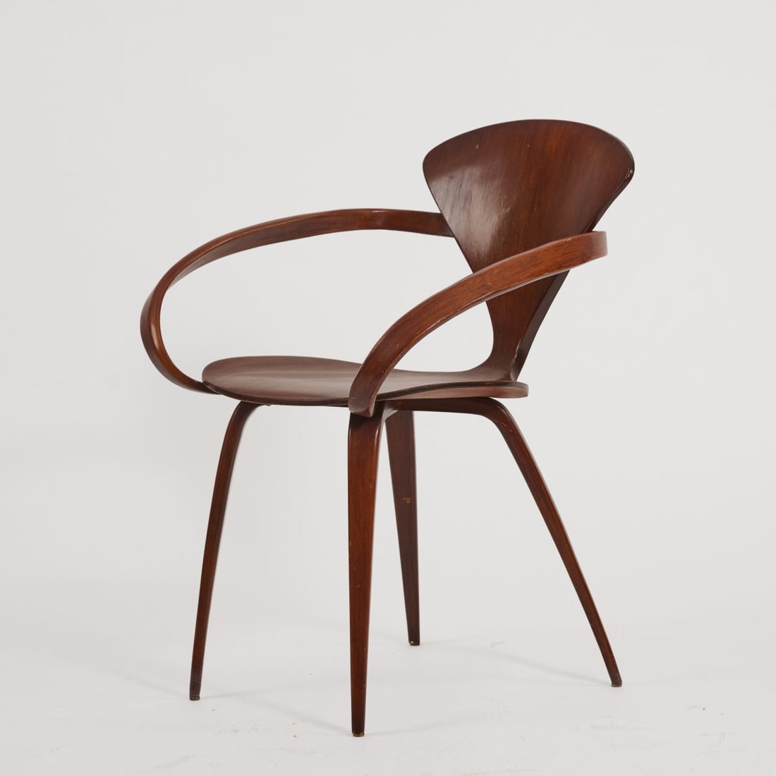 Norman Cherner, 'Cherner Chair', 1957 (design): <p>H. 67 x 61.5 x 59 cm. <br />Plycraft, Lawrence, MA. <br />Plywood, walnut veneer, stained dark.<br />Marked: Manufacturer's label with mention of
