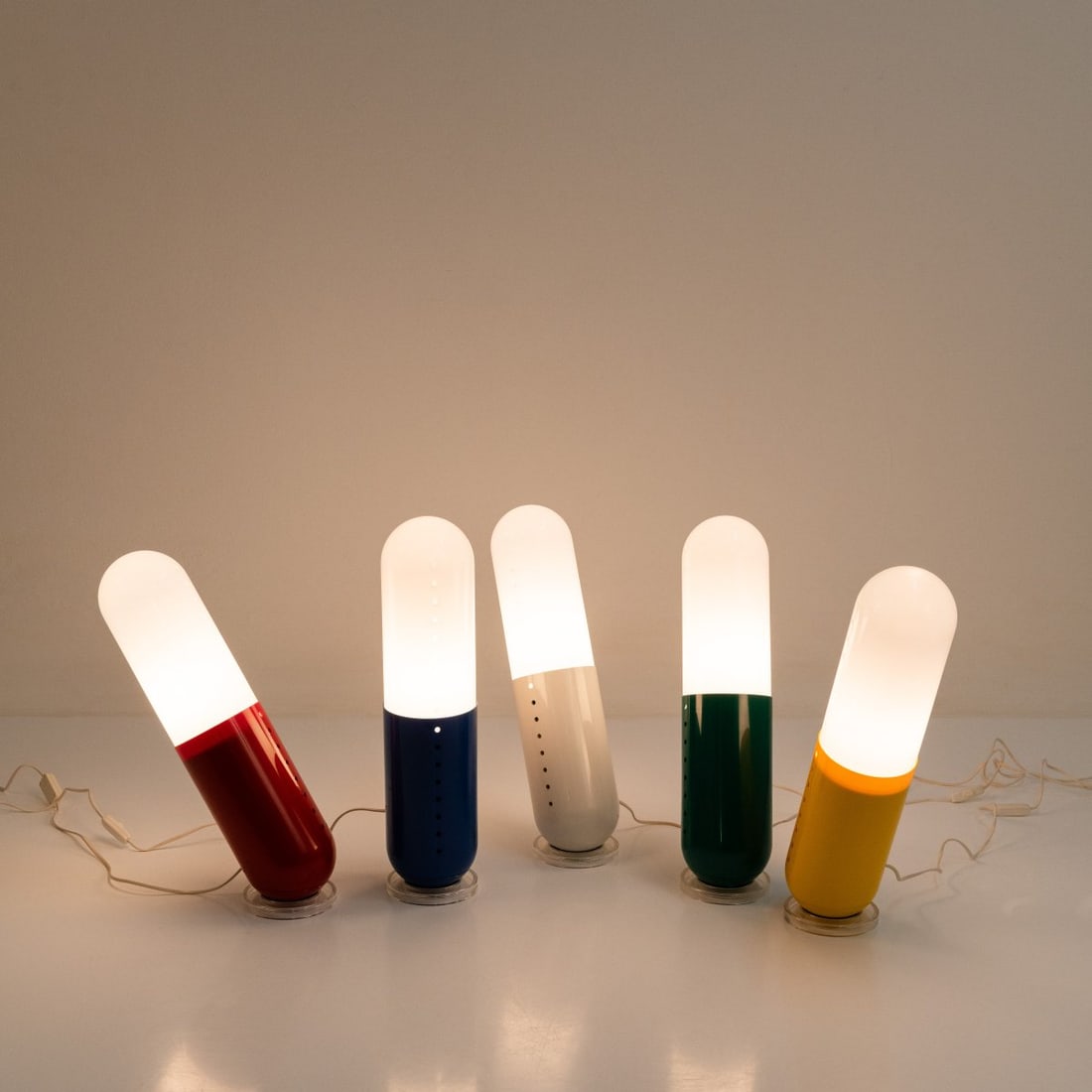 Cesare Casati; Emanuele Ponzio, Five floor lamps 'Pillola', 1968 (design): <p>H. 55 cm, &Oslash; 13 cm. <br />Nai Ponteur, Bergamo. <br />ABS plastic and acrylic, green, blue, yellow, dark red, and white. <br />Marked: Collezione nai design studio