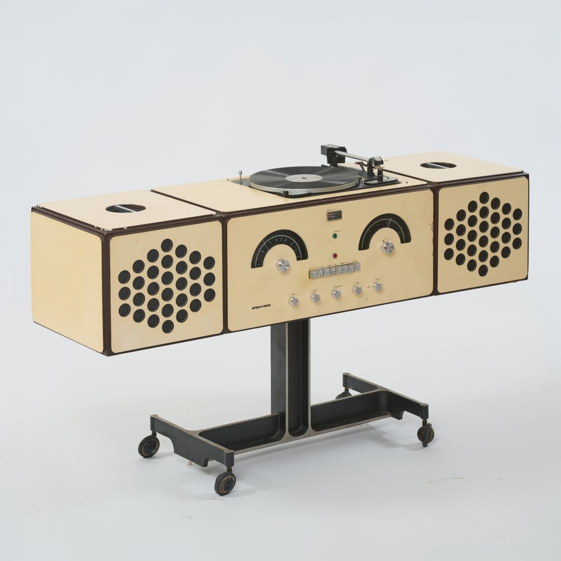 Achille Castiglioni, Stereo system 'RR-126', 1965 (design): <p>H. 90.5 x 61.5 x 38 cm (closed), H. 71 x 120 x 38 cm (open). <br />Brionvega, Milan. <br />Particleboard, walnut veneer, cr&egrave;me-white, aluminum base on four casters. <