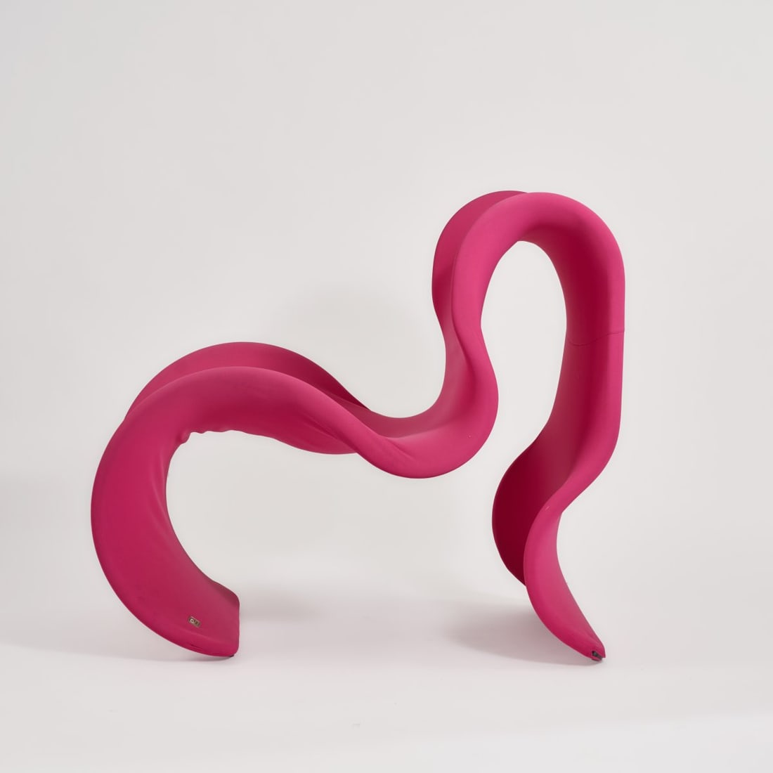 Gruppo 14, 'Fiocco' armchair, 1970 (design): <p>H. 109 x 72.5 x 120 cm. <br />Busnelli, Milan.<br />Metal tube, pink acrylic and elastane cover. <br />Marked: Manufacturer's plaque. </p><hr><p>Literature