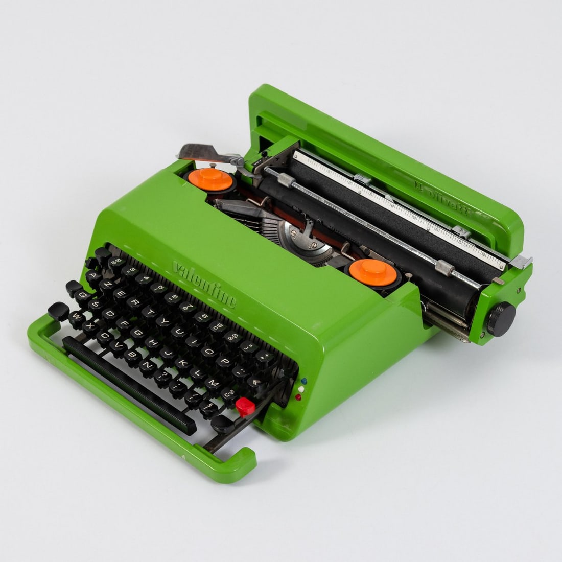 Ettore Sottsass; Perry A. King, Rare 'Valentine' typewriter, 1969 (design): <p>H. 11.5 x 34.5 x 35 cm. <br />Olivetti, Ivrea. <br />Green, black, and red plastic, black rubber. <br />Marked: Manufacturer's stamp Olivetti.</p><hr><p>Li