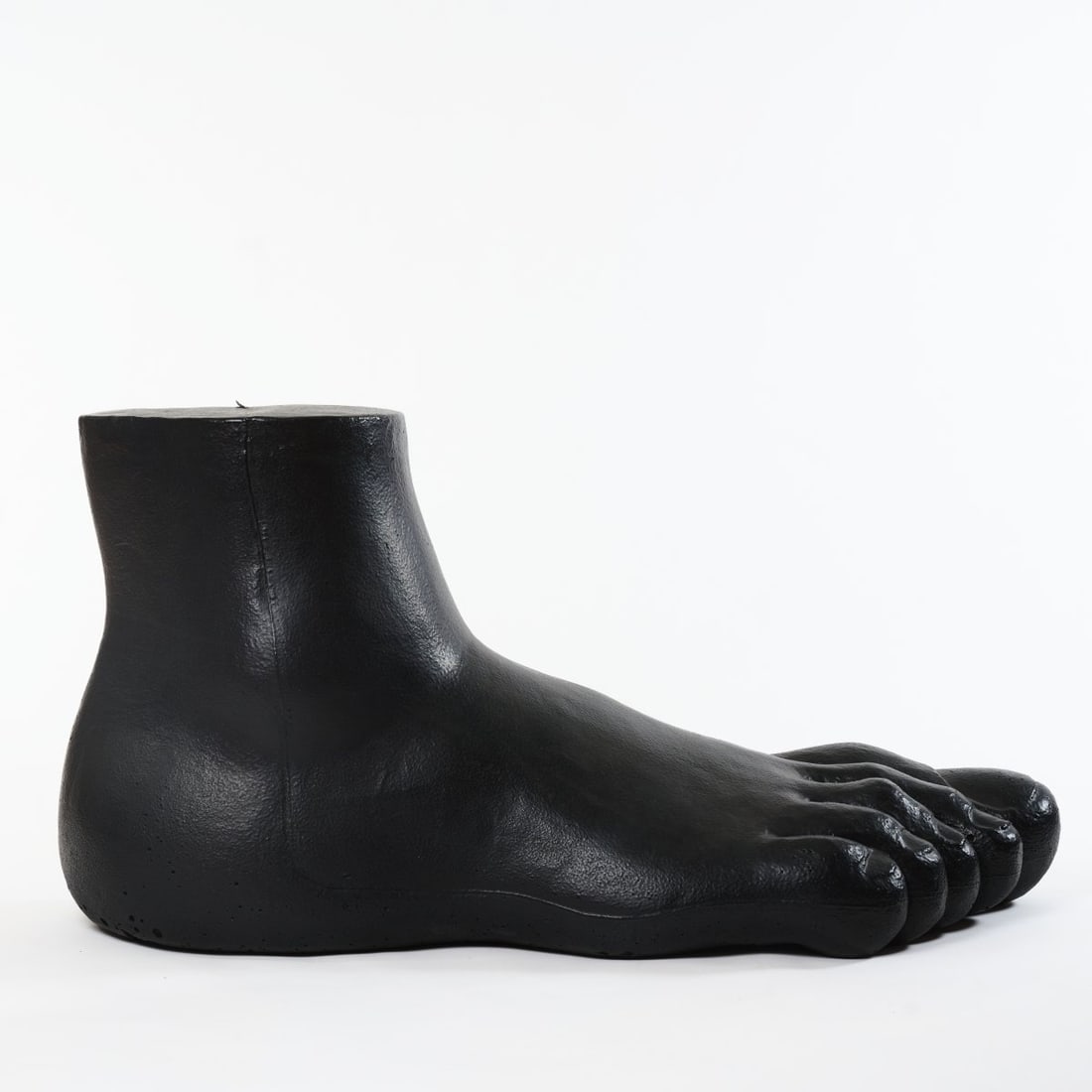 Gaetano Pesce , Seating object 'UP7' - 'Il Piede', 1969 (design): <p>H. 83 x 65 x 162 cm. <br />B&amp;B Italia, Novedrate, Como. <br />Polyurethane foam, black coating. <br />Marked: manufacturer's stamp. </p><hr><p>Lite