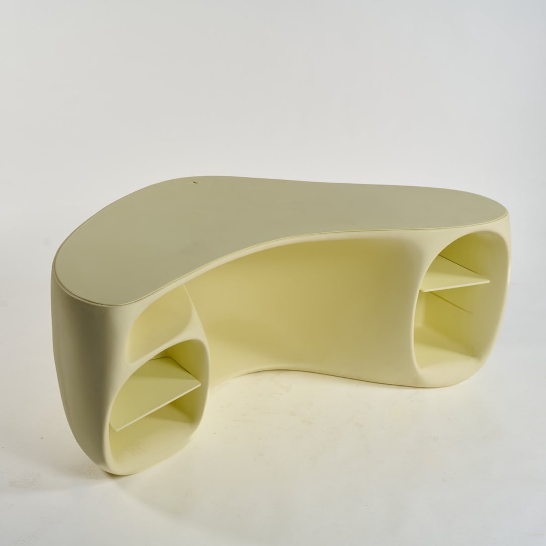 Philippe Starck, Desk 'Baobab', 2005 (design): <p>H. 72 x 178 x 105 cm. <br />Vitra, Birsfelden. <br />Plastic, yellow. <br />Marked: Manufacturer and designer's information (embossed).</p>