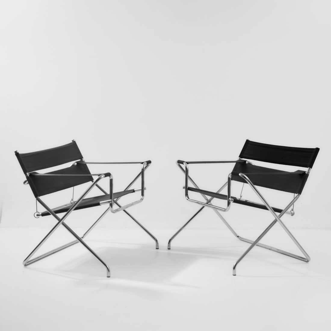 Marcel Breuer, Two 'D4' folding chairs, 1926/27 (design): <p>H. 70 x 77.5 x 63 cm. <br />Tecta, Lauenf&ouml;rde, from 1981. <br />Nickel-plated tubular steel, black iron yarn covering.<br />Marked: Manufacturer's label.</p>