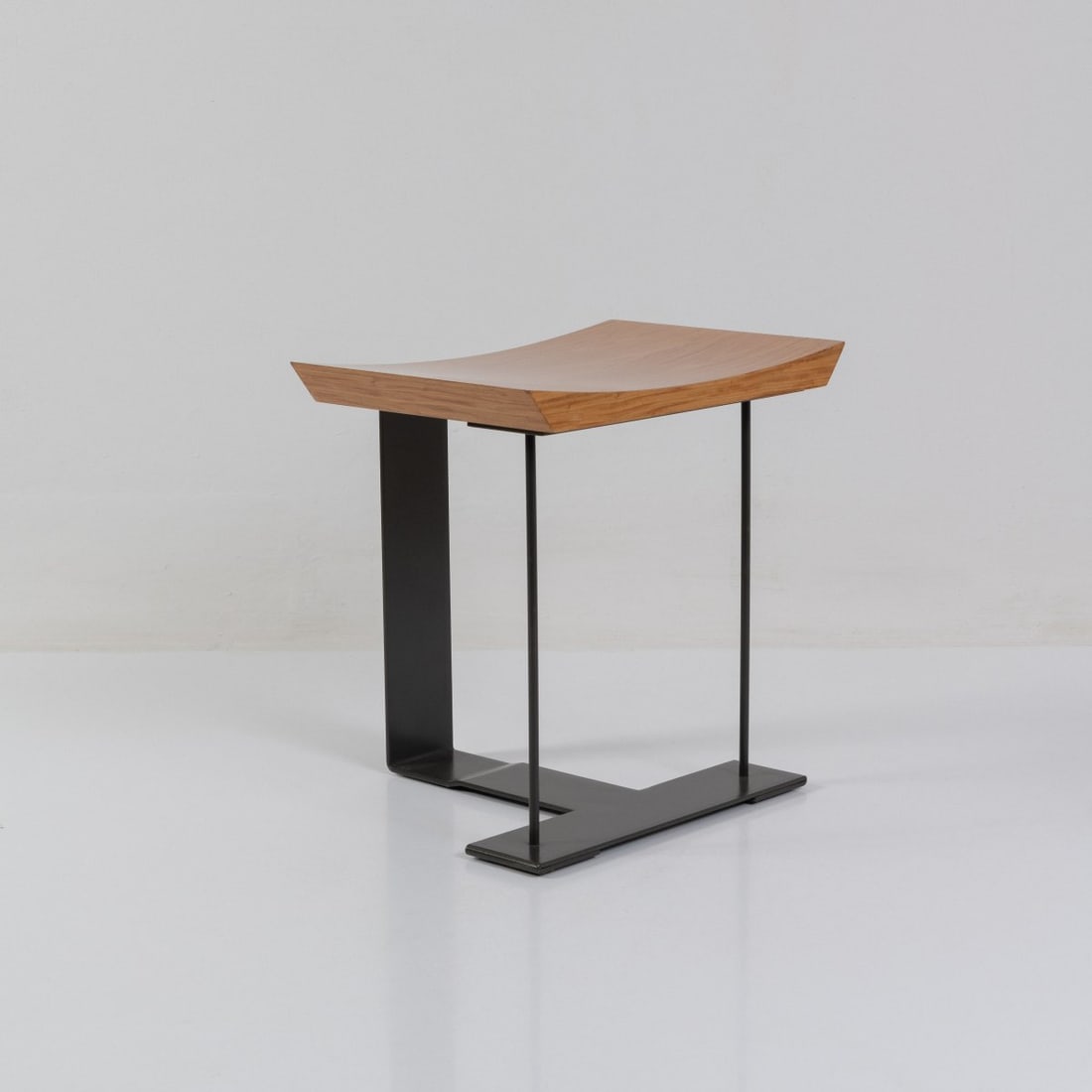 Pierre Chareau, Stool 'SN 3 - T- Stool', 1927 (design): <p>H. 48 x 49 x 41 cm. <br />Ecart International, Paris, 2000s. <br />Oak wood, patinated sheet metal. </p><hr><p>Literature:</p><p>Herbst, Pierre