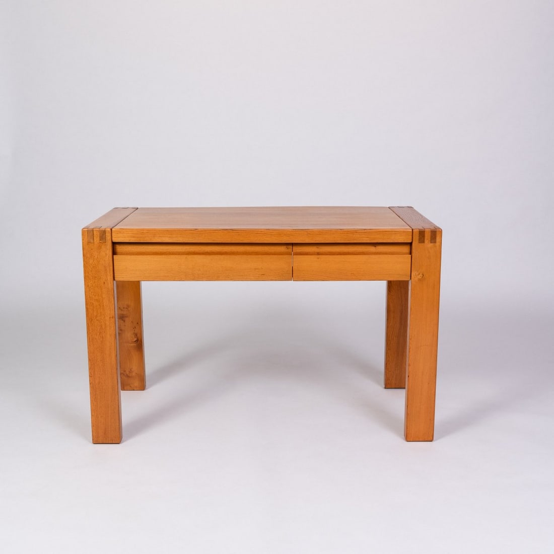 Maison Regain, Desk, 1970s (design): <p>H. 76.5 x 40 x 119.5 cm. <br />Maison Regain, France.<br />Elm wood. <br />Marked: Manufacturer's branding.</p>