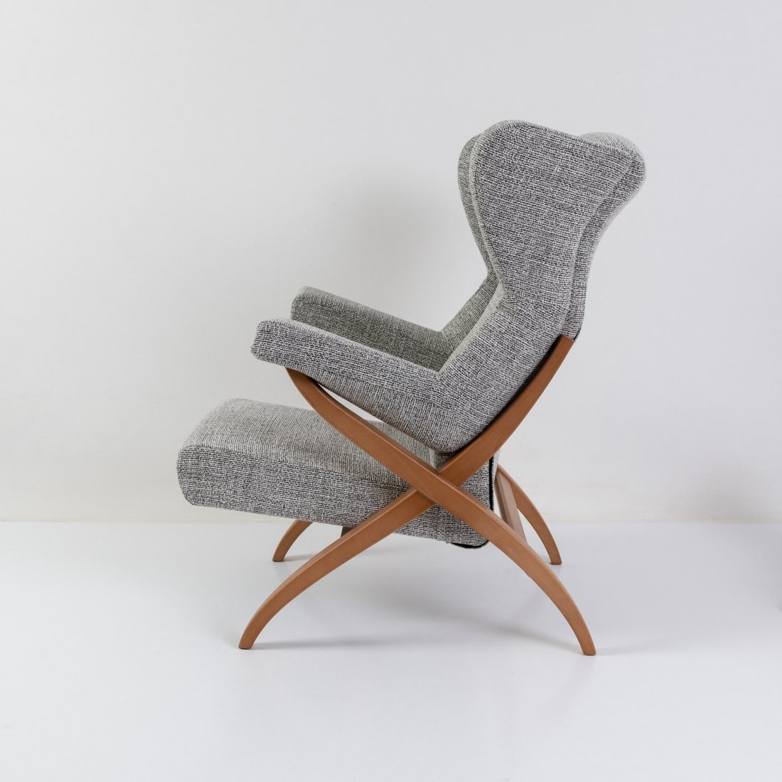 Franco Albini, 'Fiorenza' armchair, 1952 (design): <p>H. 103 x 70.5 x 92 cm. <br />Arflex, Milan, 2020s. <br />Walnut wood, gray melange textile upholstery. <br />Marked: Manufacturer's stamp.</p><hr><p>Litera