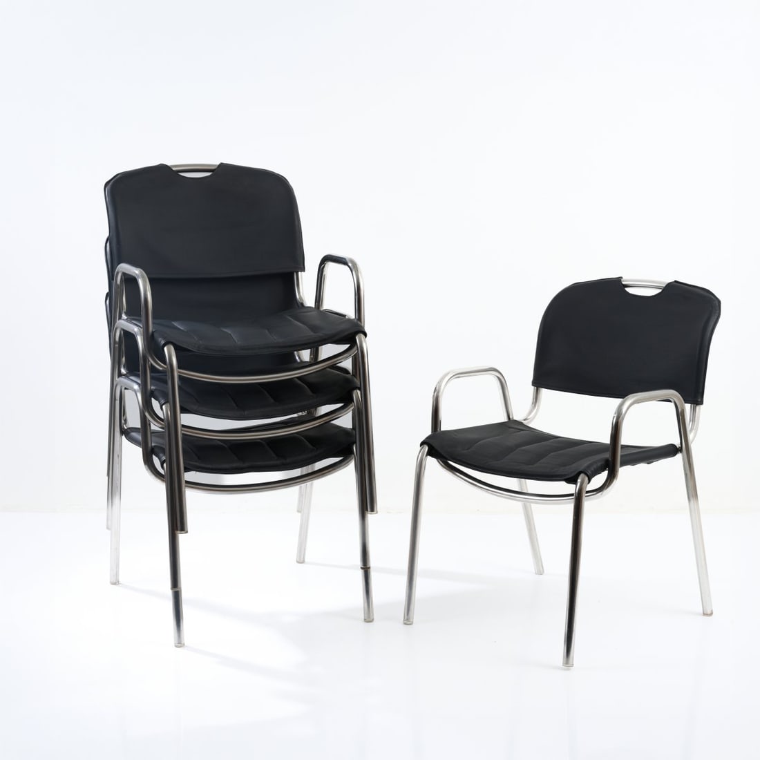 Achille Castiglioni; Marcello Minale, Four chairs 'Castiglia', 1967 (design): <p>H. 79.5 x 56 x 68 cm. <br />Zanotta, Milan. <br />Stainless steel tubing, black leather.</p><hr><p>Literature:</p><p>Polano, Castiglioni, Milan 2001,