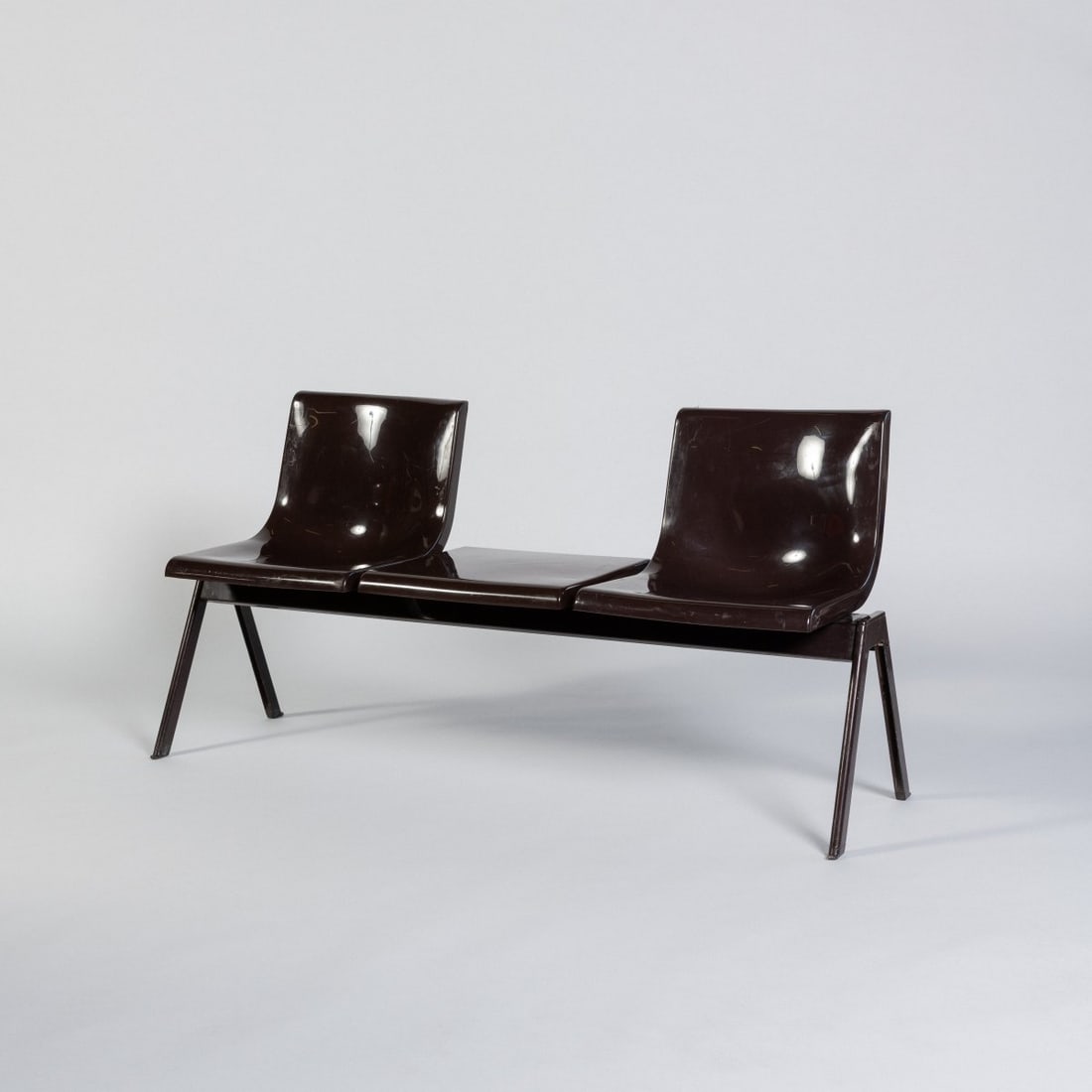 Ettore Sottsass , 'Synthesis' bench with storage, 1970-72 (design): <p>H. 75 x 151 x 53 cm. <br />Olivetti, Ivrea. <br />Brown plastic, square metal tubing, brown lacquer. <br />Marked: Manufacturer's stamp.</p>