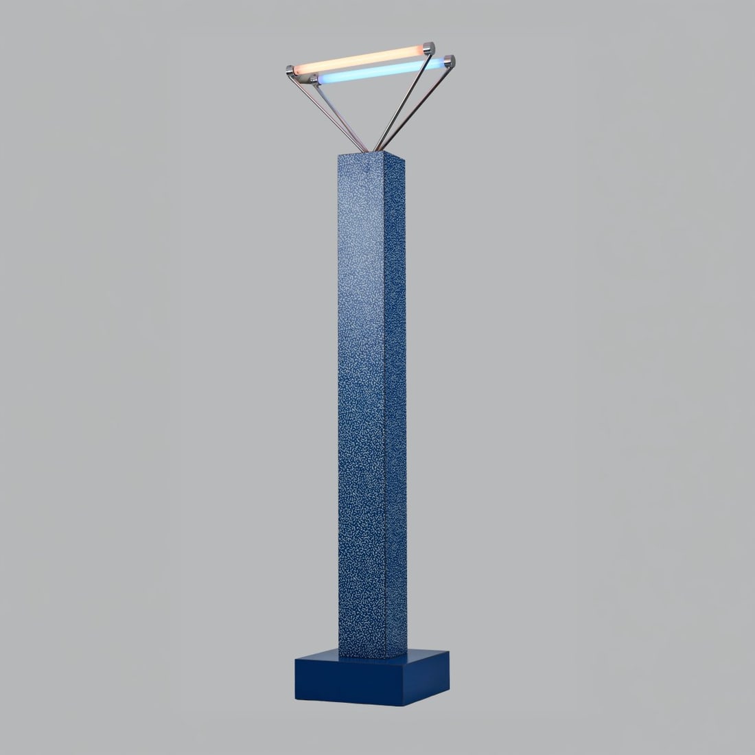 Ettore Sottsass , Floor lamp 'Svincolo', from the 'bau.haus' collection, 1979 (design): <p>H. 250 x 45 x 45 cm. <br />Alchimia, Milan. <br />Wood, laminate, blue, white (partially with 'Bacterio' pattern), chrome-plated metal tube, fluorescent tubes. </p><hr>