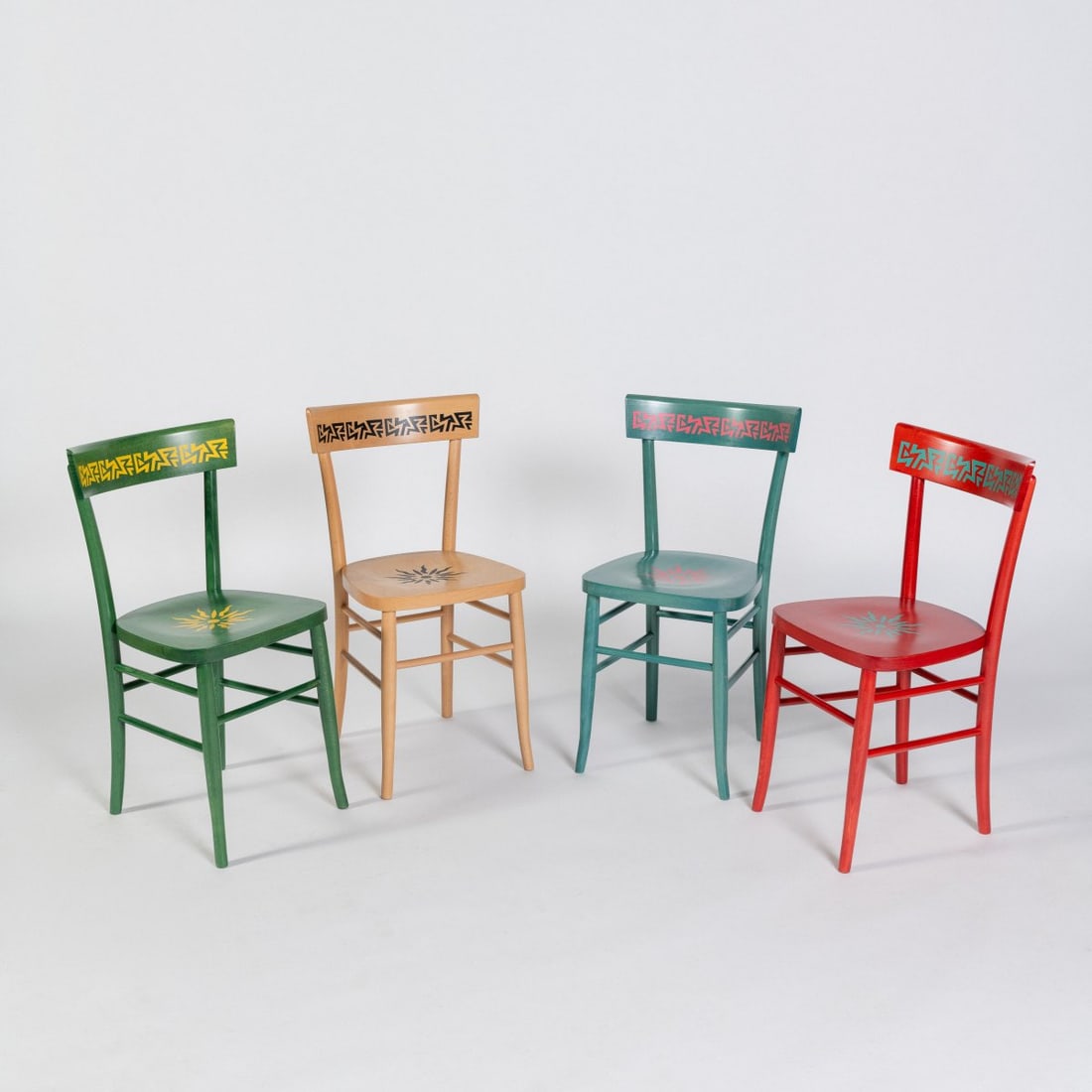 Alessandro Mendini, Four 'Belep' chairs from the 'Easy Home' collection, 1995 (design): <p>H. 83.5 x 44 x 44.5 cm. <br />Memphis, Milan. <br />Beechwood, stained green, turquoise, red and colorless, screen print.</p>