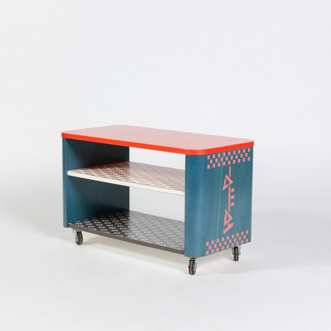 Alessandro Mendini , 'Bora-Bora' shelf on casters from the 'Easy Home' collection, 1995 (design): <p>H. 50 x 80.5 x 40.5 cm. <br />Memphis, Milan. <br />Wood, painted blue-green and red, screen print, polychrome plastic laminates.</p>