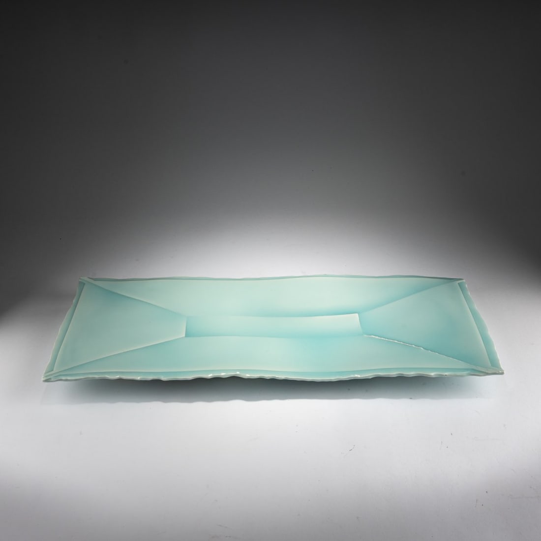 Masamichi Yoshikawa, Bowl 'Ban 01-36', 2001 (design): <p>H. 5 x 69.5 x 24 cm. <br />Masamichi Yoshikawa. <br />Porcelain, white, glazed, translucent, celadon (Seihakuji) overglaze. Underside with anthracite gray and reddish-brown drawin