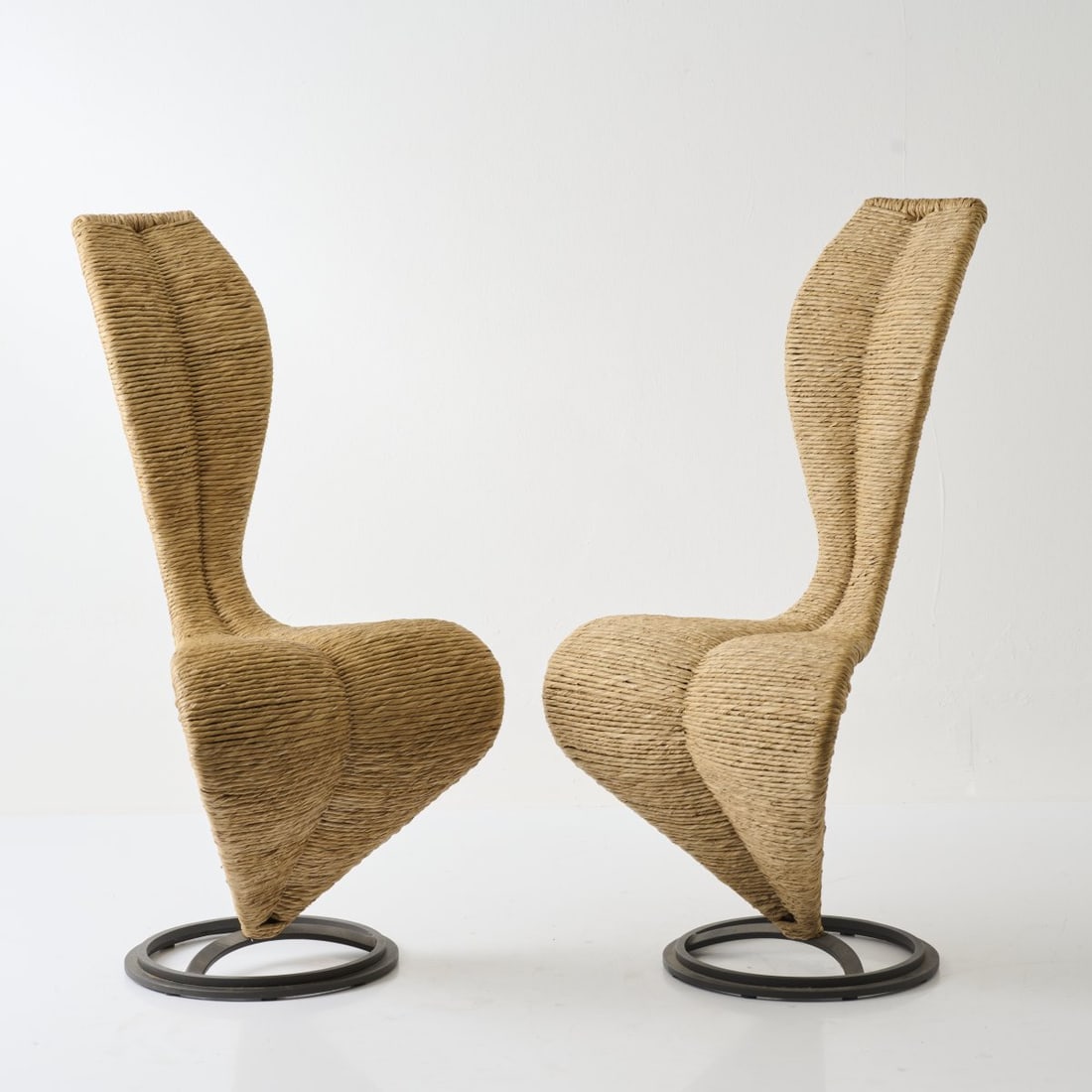 Tom Dixon, Set of two 'S' chairs, 1988 (design): <p>H. 101,5 x 49 x 57 cm. <br />Cappellini, Milan. <br />Cast metal, varnished gray, rush. </p><hr><p>Literature:</p><p>Fiell, 1000 Chairs, Cologne, 199