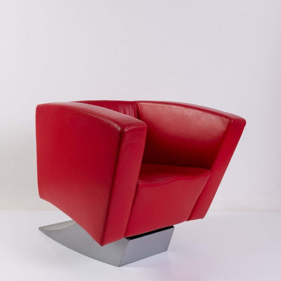 Ron Arad, Armchair 'Low Tilt' from the 'Spring Collection', 1990 (design): <p>H. 78.5 x 83 x 119 cm. <br />Moroso, Tavagnacco. <br />Sheet metal, lacquered silver-gray, red leather.</p><hr><p>Literature:</p><p>Sudjic, Ron Arad,
