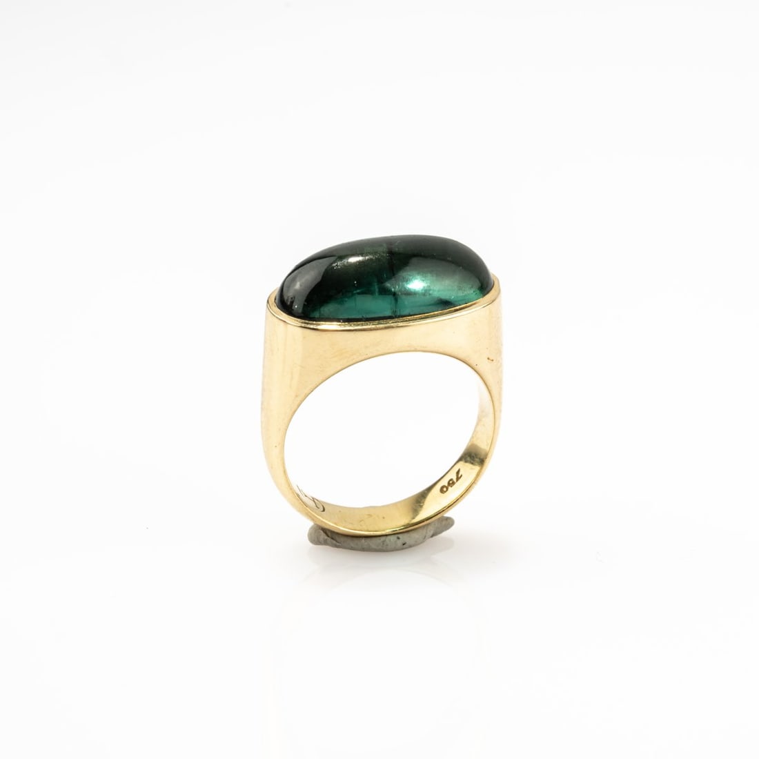 Friedrich Becker (1922 Ende near Herdecke - 1997 Düsseldorf), Ring, 1960s: <p>18k yellow gold (750), tourmaline cabochon. <br />9.35 grams. Ring size 56.5. <br />Stamped: artist's mark, 750.</p>