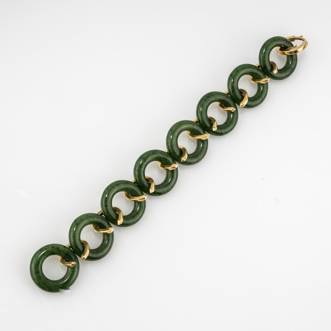 Friedrich Becker (1922 Ende near Herdecke - 1997 Düsseldorf), Bracelet, 1964: <p>18k yellow gold (750), nephrite rings. <br />55.41 grams. Length 205 mm. <br />Stamped: artist's mark, 750.</p><hr><p>Literature:</p><p>Cf. Hildegard