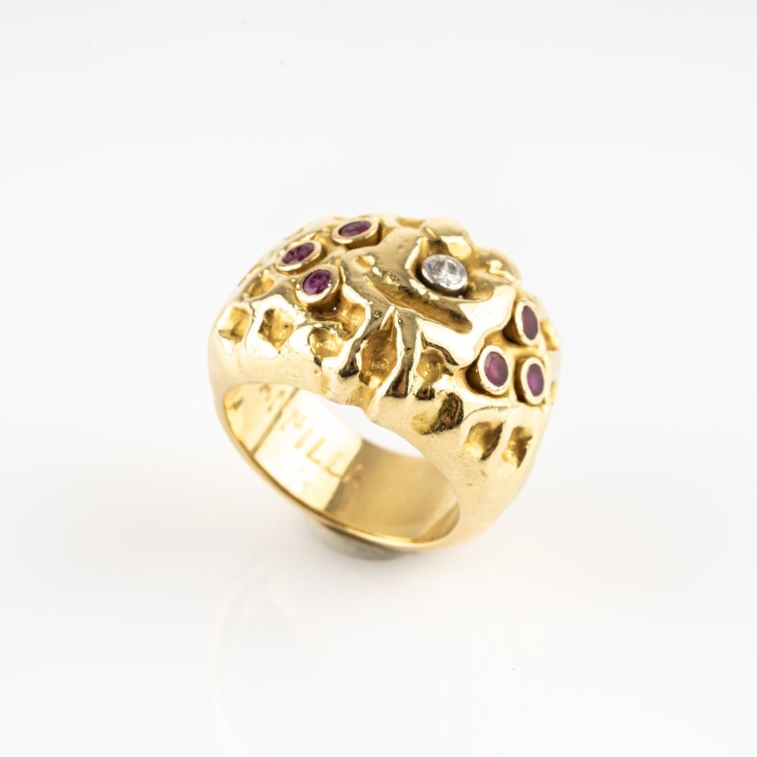 Franco Cannilla (1911 Caltagirone - 1984 Rome), Unique ring, 1950s: <p>18k yellow gold (750), six rubies (total approx. 0.60 ct., calculated weight), diamond (approx. 0.20 carats, calculated weight). <br />9.60 grams. Ring size 51. <br />Unique