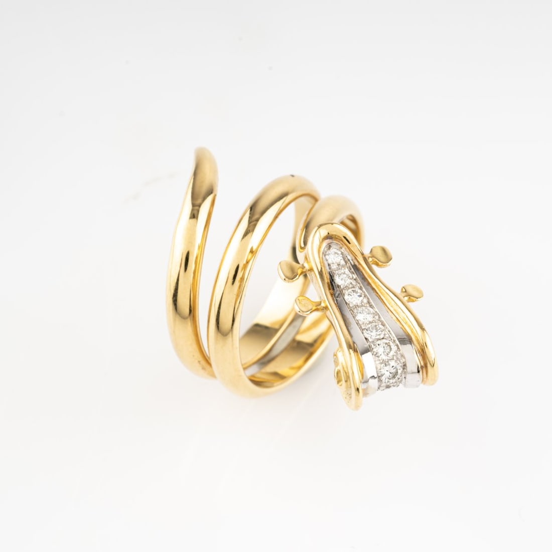 Armand Fernandez (Arman) (1928 Nice - 2005 New York), 'Violin' ring, 1994: <p>18k yellow gold (750), nine brilliant-cut diamonds (approx. 0.34 ct., calculated weight). <br />12.49 grams. Ring size 56, top 30 x 20 mm. <br />Number 2 of 8 pieces and IV PA (Pr