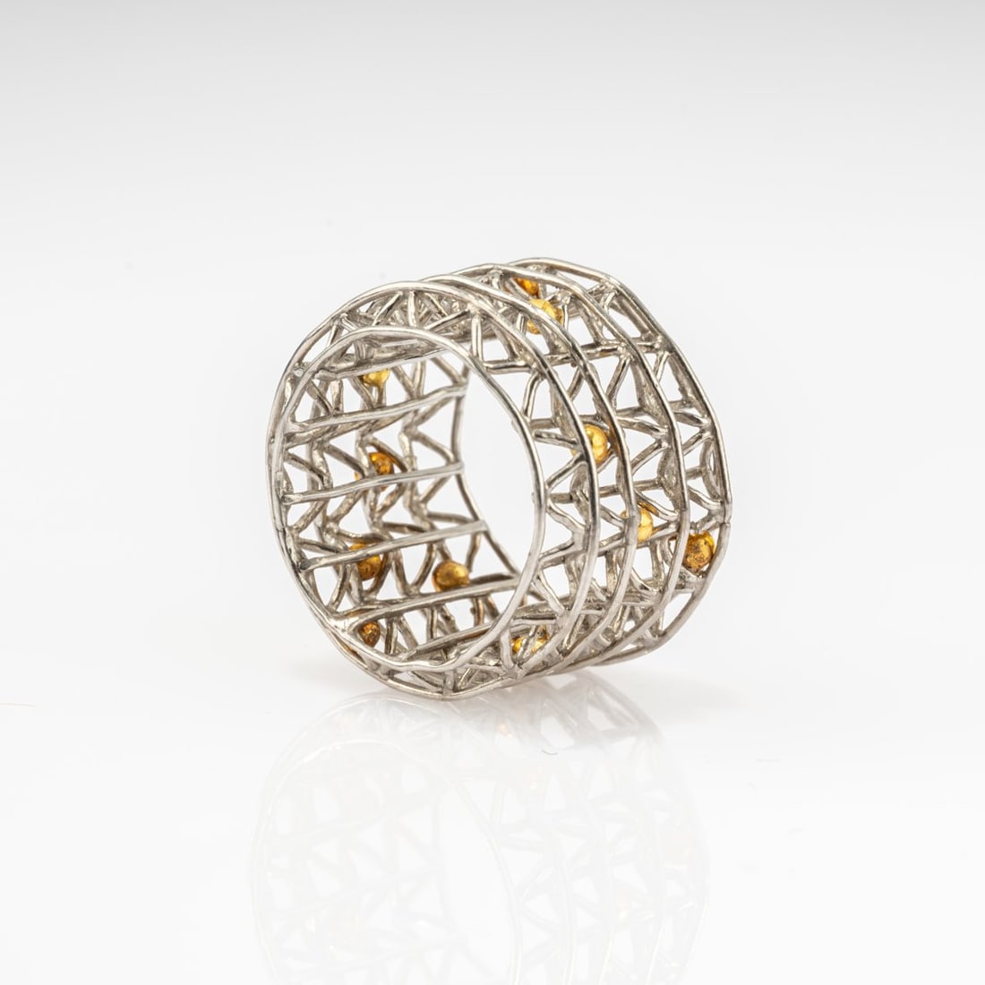 Peter Hassenpflug (1932 Wuppertal - lives in Dusseldorf), 'Cage Ring', 1999: <p>Platinum, fine gold. <br />10.44 grams. Ring size 54.</p>