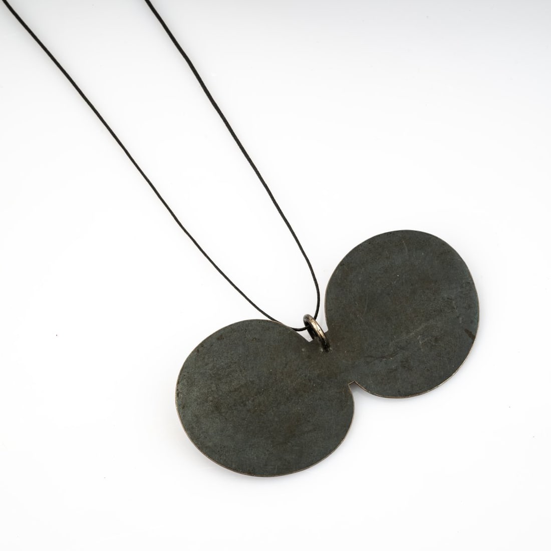 Otto Künzli (1948 Zurich lives in Munich), Pendant from the series 'Cozticteocuitlatl', 1995-98: <p>Blackened silver. <br />32.25 grams. 47 x 94 mm. </p><hr><p>Literature:</p><p>Florian Hufnagel (ed.): Otto K&uuml;nzli. The Book, Stuttgart 2013, pp. 4