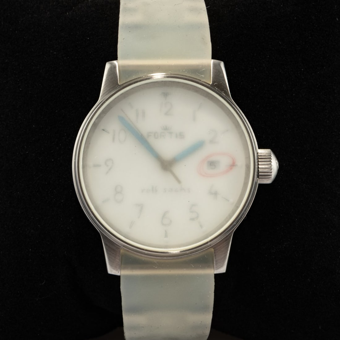 Rolf Sachs, Wristwatch 'Frisson', 2008 (design): <p>Ref. 595.11.46.3. Stainless steel case, mineral crystal, automatic movement, white dial, silicone strap with folding clasp. <br />12.09 grams. Case diameter 40 mm. <br />Dial mark