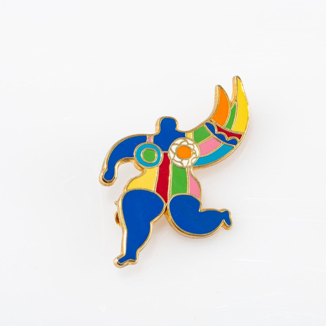 Niki de Saint Phalle (1930 Neuilly-sur-Seine - 2002 La Jolla, CA), Brooch/pendant 'Ange' (guardian: <p>Metal, gold-plated, polychrome enamel. <br />8.14 grams. 50 x 34 mm. <br />Signed and stamped: Artist's signature, NCAF&reg;.</p>