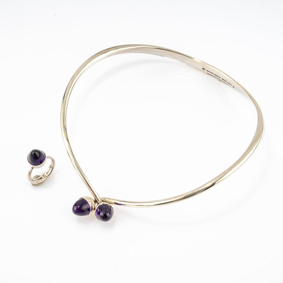 Bent Knudsen; Anni Knudsen, Necklace '5' and ring '1', 1960s: <p>Sterling silver, amethyst. <br />Necklace 85.63 grams. &Oslash; 115-120 mm; Ring 6.18 grams. Thru 54.5. <br />Stamped: Manufacturer's mark &copy;, 925S, STERLING DENMARK, 