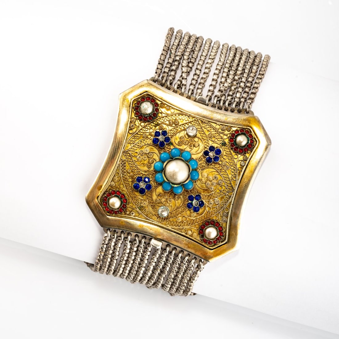 Hamburg, Antique choker, 1870 ca: <p>Silver, gold-plated, various gemstones and cabochons. <br />136.25 grams. Centerpiece 63 x 63 mm. <br />Stamped: STEIGENBERGER, assay mark, Hamburg silver mark.</p>