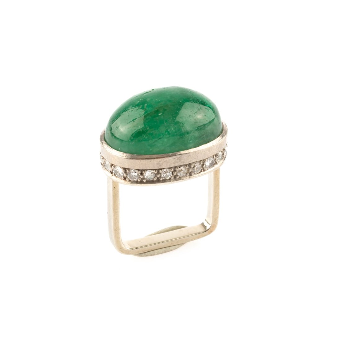 , Ring with emerald cabochon: <p>14k white gold (585), emerald cabochon (approx. 16.49 ct., calculated weight), diamond setting around the band. <br />10.05 grams. Ring size 52.5. <br />Stamped: 585.</p>
