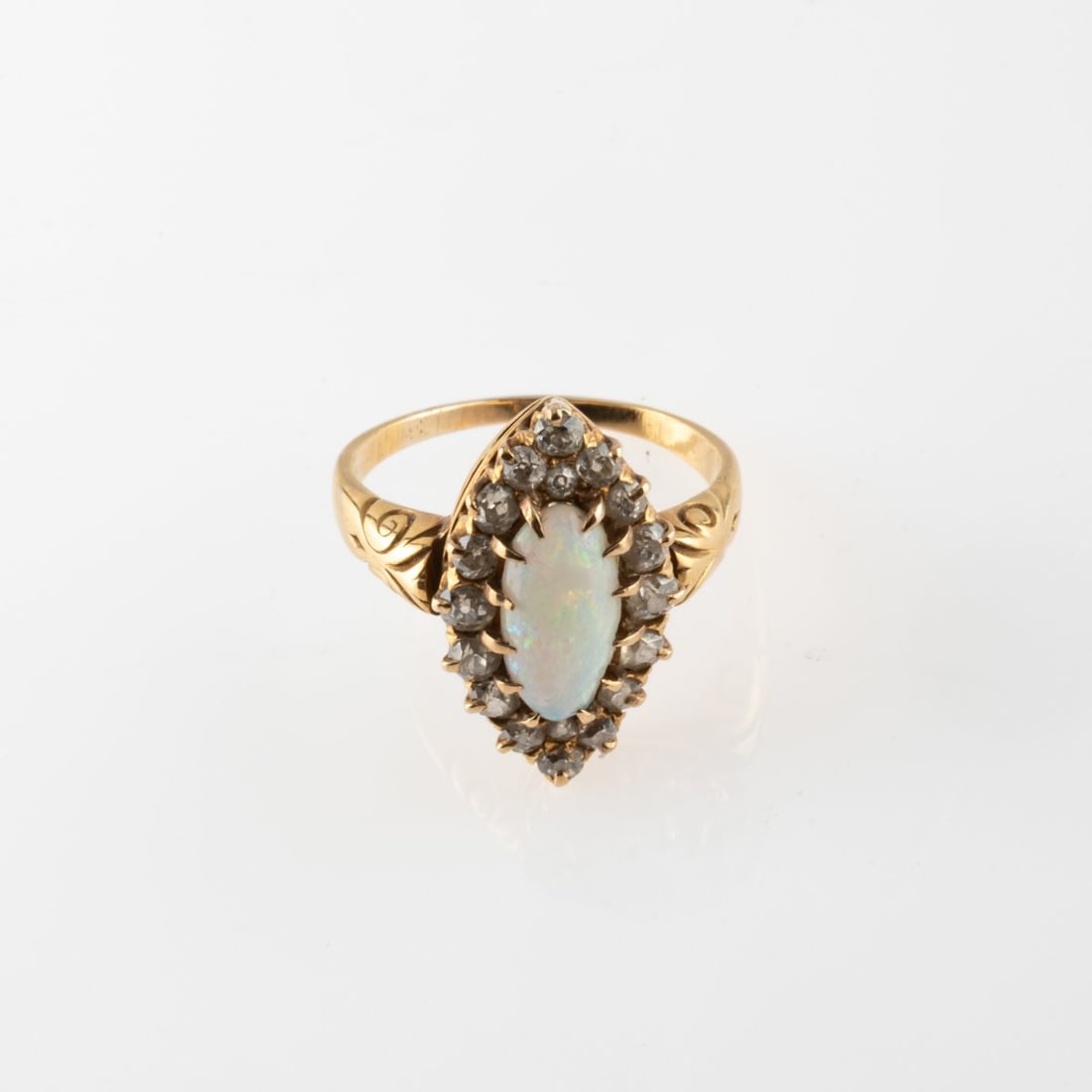 , Art Deco navette ring with opal and diamonds: <p>14k yellow gold (585), opal cabochon, 18 single cut diamonds. <br />4.22 grams. Ring size 54. <br />Stamped: 585.</p>