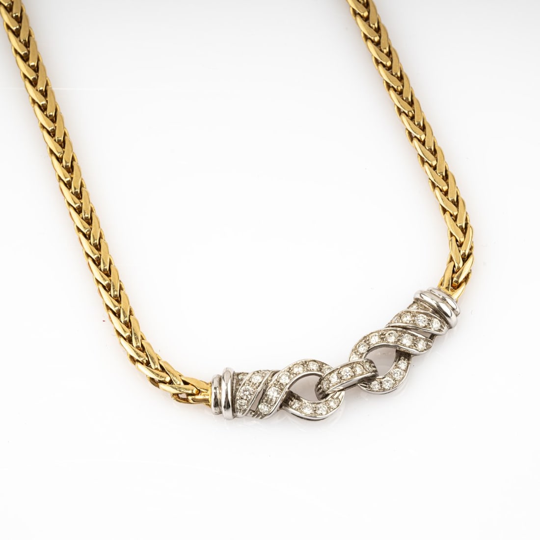 Brasolin, Milan, Gold necklace with diamonds: <p>18k yellow and white gold (750), 35 small brilliant-cut diamonds. <br />47.79 grams. L. 425 mm. <br />Stamped: 750, workshop mark.</p>