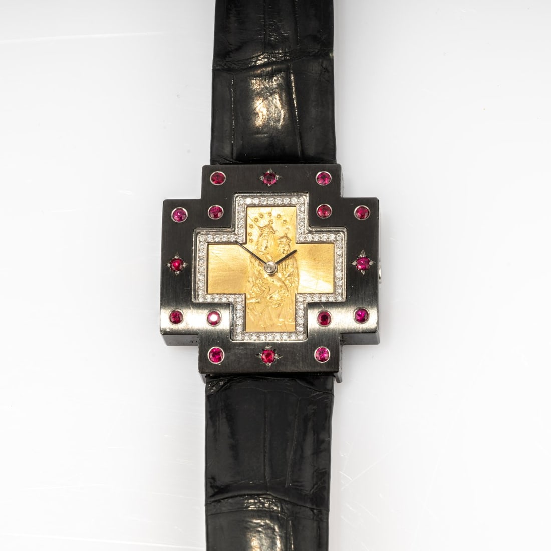 Sévigné, Munich, Unique ladies' watch 'Madonna': <p>Model No. 3570. Stainless steel case, 18k yellow gold (750), 16 round-cut rubies, brilliant-cut diamonds, dial with icon motif, black leather strap. <br />54.55 grams. Case 34 x 34 mm. 