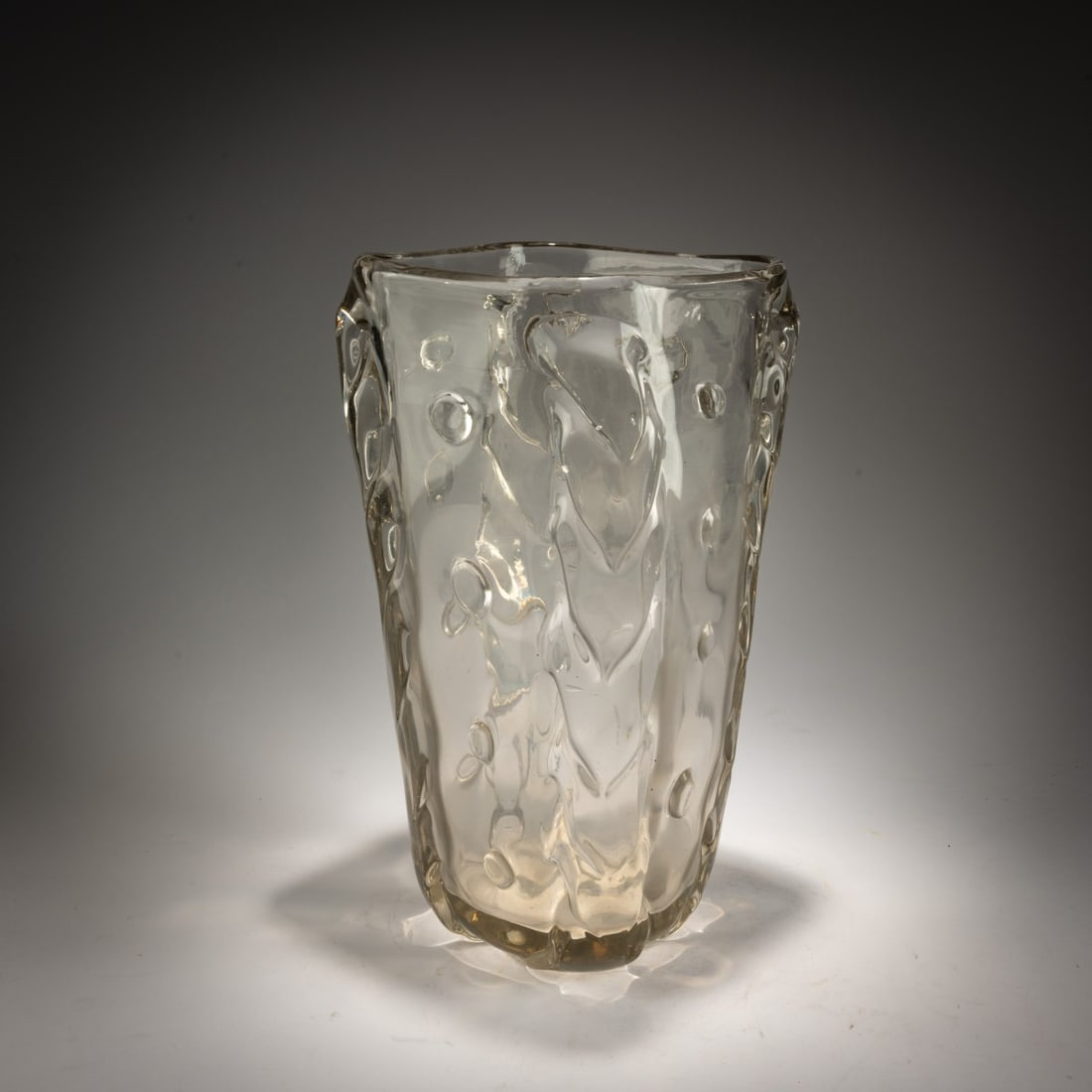 Flavio Poli, Vase, c. 1937: <p>H. 35.4 cm. Execution: Seguso Vetri d'Arte. Colorless glass, application, and four handles made of colorless glass. </p><hr><p>Literature:</p><p>Cf.